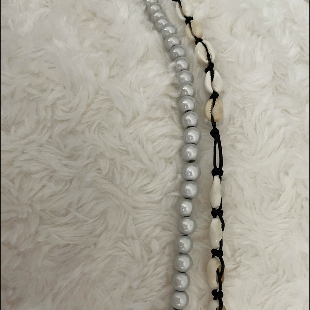 shell necklace and pearl reflection necklace